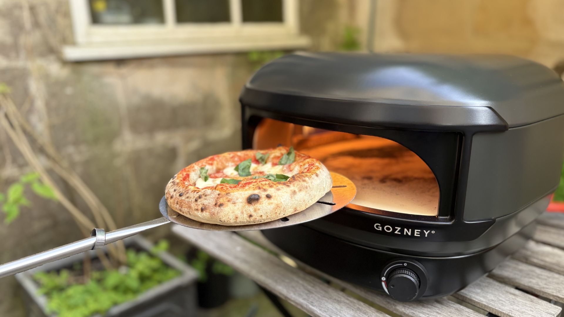 Gozney Arc Lite Pizza Oven being tested outside