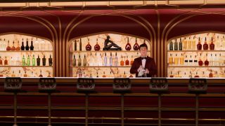 Arthur the bartender at the bar in Passengers