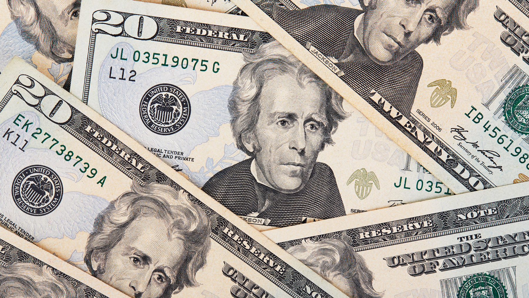 $20 bills in a pile