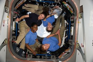 Four women serving together on the International Space Station on April 14, 2010, represented the highest number of women in space simultaneously. Clockwise from lower right are NASA astronauts Dorothy Metcalf-Lindenburger, Stephanie Wilson, both STS-131 mission specialists; and Tracy Caldwell Dyson, Expedition 23 flight engineer; along with Japan Aerospace Exploration Agency (JAXA) astronaut Naoko Yamazaki, STS-131 mission specialist. 