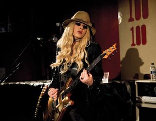 Orianthi with her Custom 24 Goldtop.