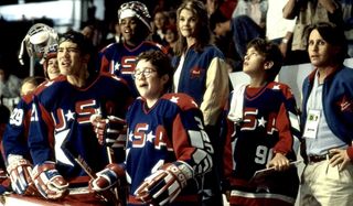 D2: The Mighty Ducks Coach Gordon and his players watch the action from the box