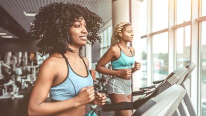 Women running on treadmills