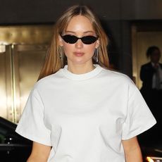 *EXCLUSIVE* Jennifer Lawrence turned heads in a chic black-and-white ensemble as she made her way to The Tonight Show Starring Jimmy Fallon in New York City. The actress kept it sleek and sophisticated, showing off her signature style.