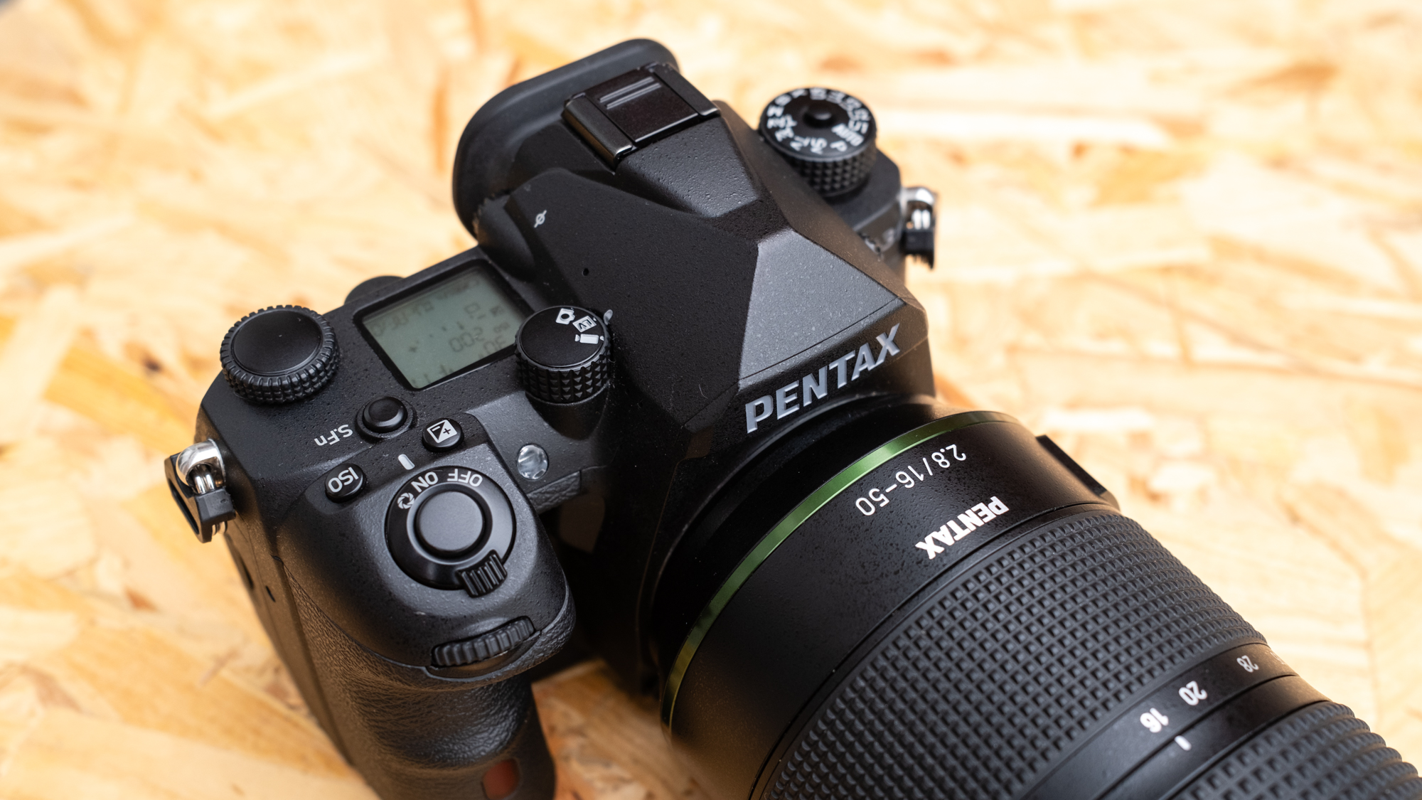 Prouct photo of the Pentax K-3 Mark III Monochrome with a 16-50mm f/2.8 attached