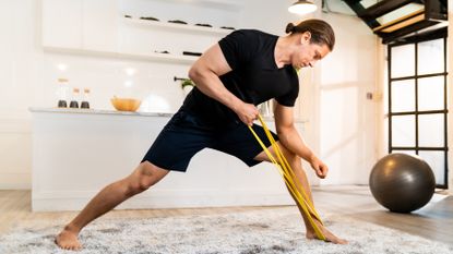 Man doing a resistance band row