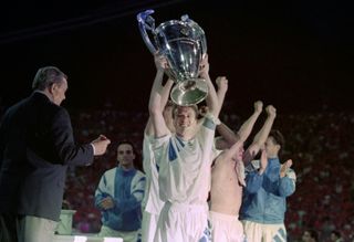 Didier Deschamps lifts the Champions League trophy after Marseille's win over AC Milan in the 1993 final.