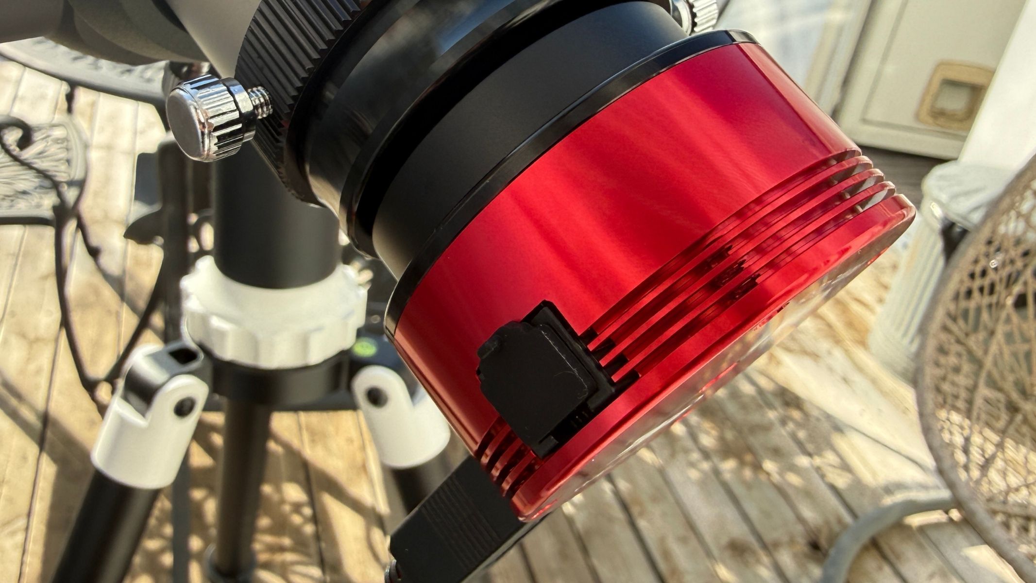 The ZWO ASI174mm mono camera attached to the bottom of the Sky-Watcher Heliostar 76Ha solar telescope.