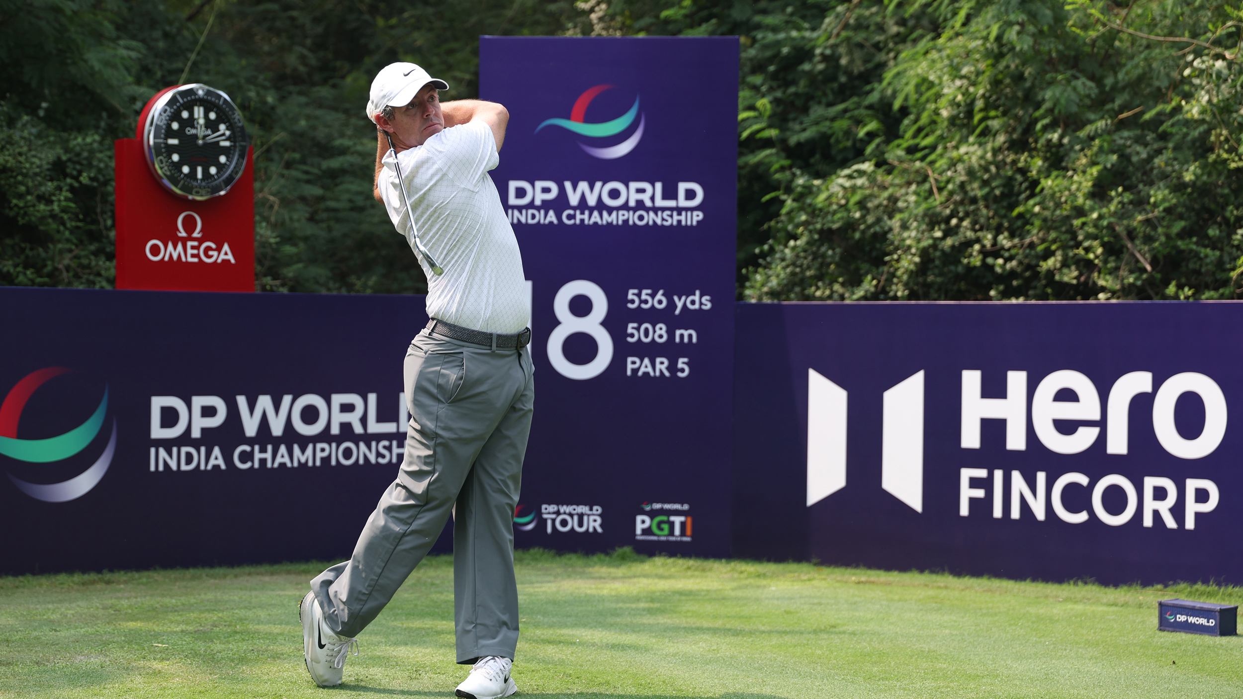 Rory McIlroy holds his finish on his tee shot on the 8th hole during a practice round at the DP World India Championship