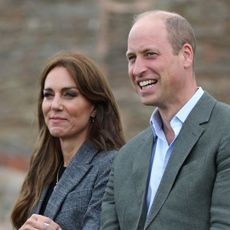 Kate Middleton and Prince William both wear blazer jackets and can't stop laughing