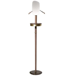 A wooden valet stand with mirror