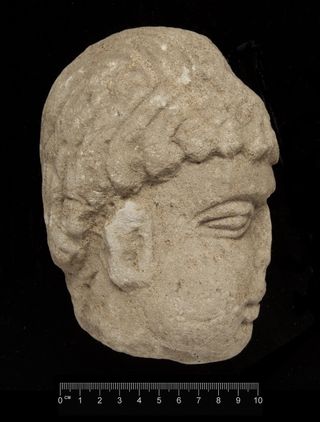 Carved Stone Head, side view