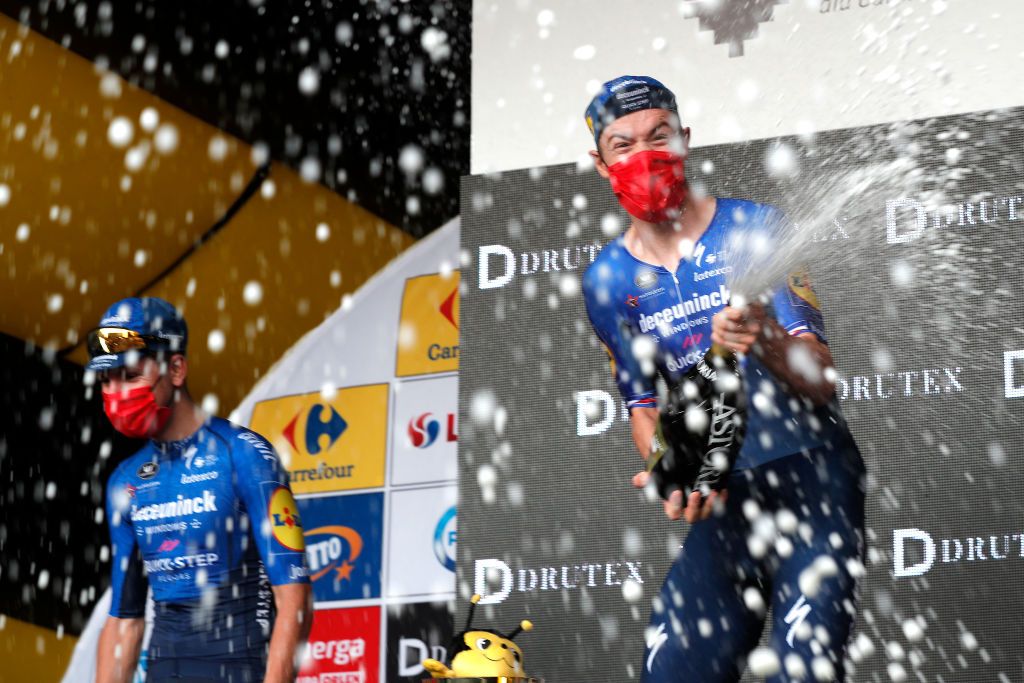 KATOWICE POLAND AUGUST 14 Rmi Cavagna of France and Team Deceuninck QuickStep celebrates winning the stage on the podium ceremony after the 78th Tour de Pologne 2021 Stage 6 a 19km Individual Time Trial stage from Katowice to Katowice TourdePologne TDP2021 UCIWT on August 14 2021 in Katowice Poland Photo by Bas CzerwinskiGetty Images