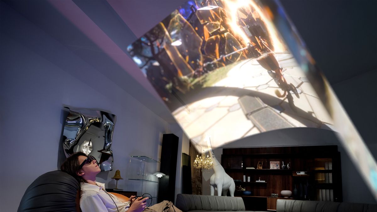 A woman plays video games on a virtual screen via Xreal One smart glasses