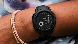 Garmin Instinct watch showing smartphone app notifications