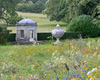 urn used as an eyecatcher in garden at Kedleston to draw eye to view National Trust