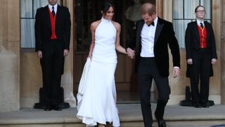 Prince Harry, Duke of Sussex and Meghan Markle, Duchess of Sussex leave to attend an evening reception