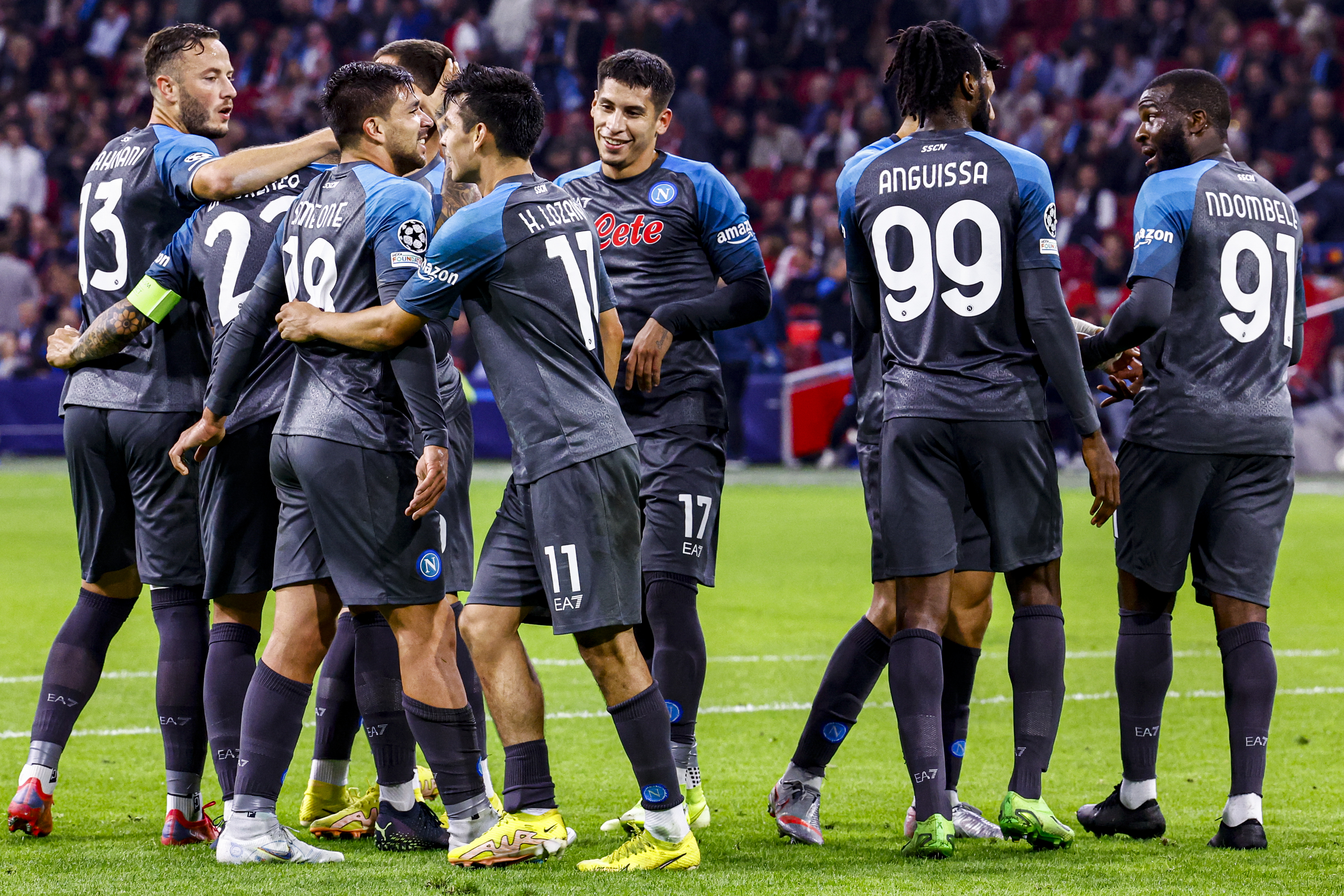 Napoli players celebrate a goal against Ajax in the Champions League in October 2022.