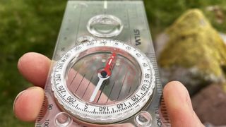 how to take a bearing: aligning the north needle with the north arrow