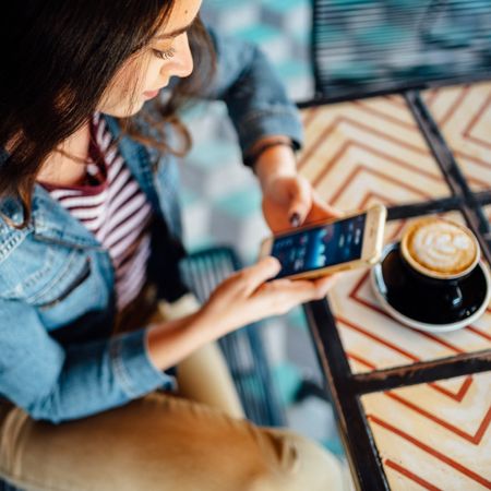 Woman logs into her financial app