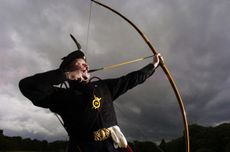 A member of The Royal Company of Archers shooting for the Musselburgh Silver Arrow.