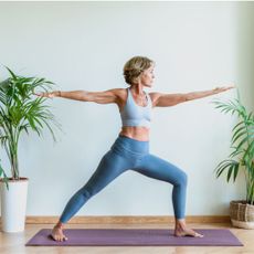 How to get fit in your 50s: A woman doing yoga
