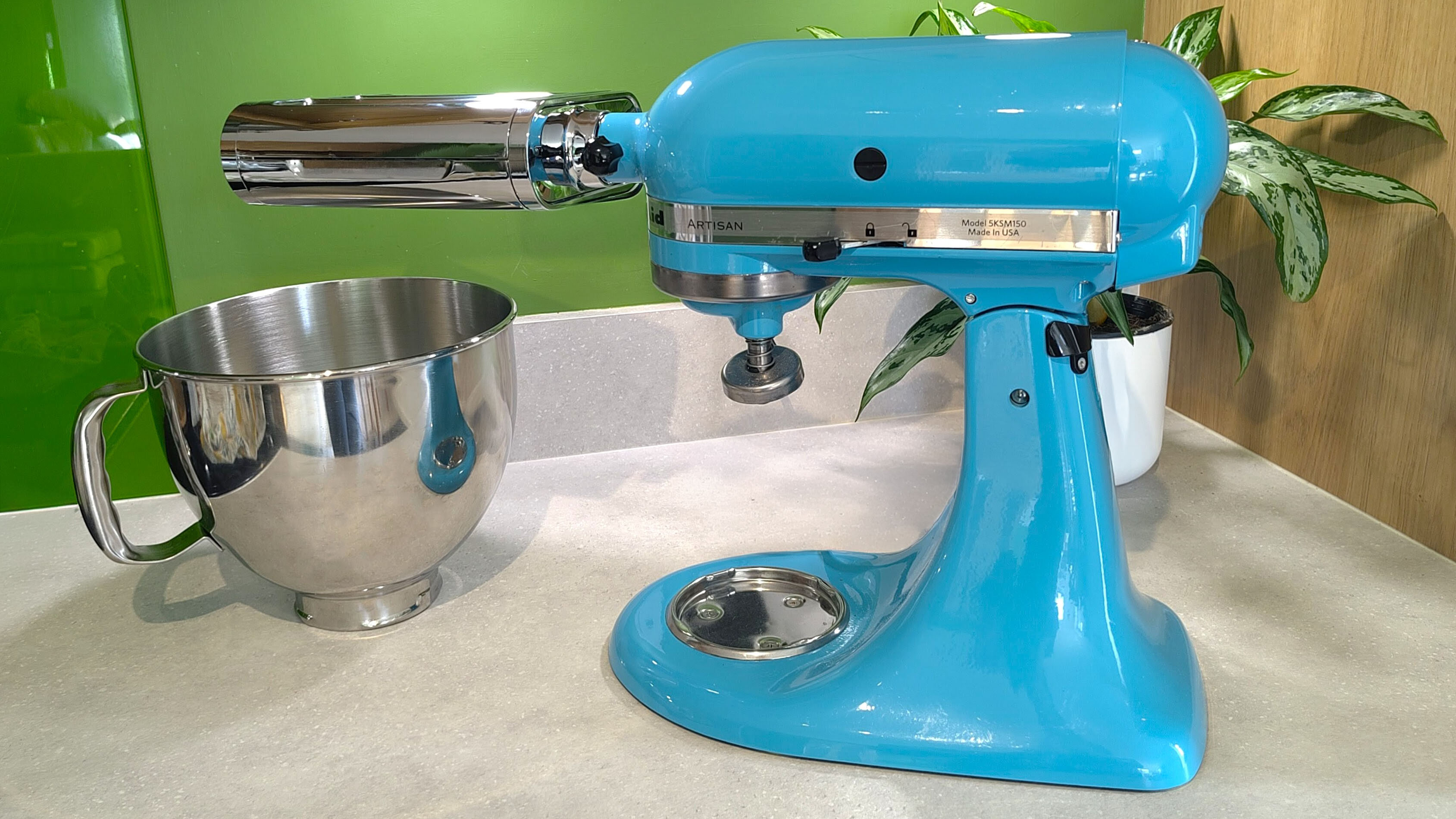 KitchenAid stand mixer with pasta roller attachment on kitchen counter