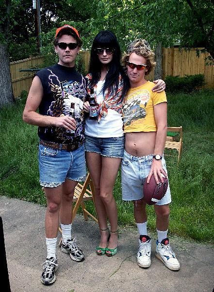 Reverend Koenig, my fiancee, and Walker Ferguson showing off their BBQ style.