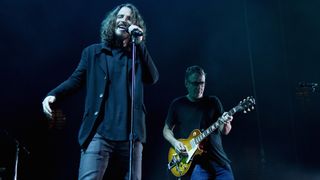 Gossard onstage with Chris Cornell during Temple Of The Dog's 2016 reunion tour 