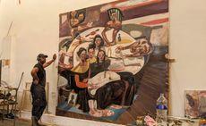 Ethiopian Pavilion artist Tesfaye Urgessa pictured in his studio with large-scale painting