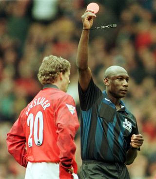 The Norway international was dismissed for a cynical foul against Newcastle and received a standing ovation from the Old Trafford crowd in April 1998 (Owen Humphreys/PA)