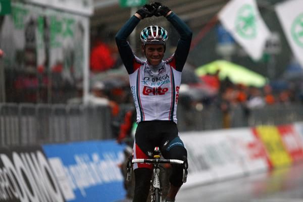 Belgium's Philippe Gilbert soloed to victory in a wet, miserable Giro di Lombardia.