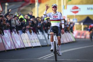 Dutchman Mathieu Van Der Poel celebrates as he crosses the finish line to win the men's elite race at the cyclocross cycling event in Hoogerheide, Netherlands, Sunday 28 January 2024, stage 14/14 in the World Cup ranking. BELGA PHOTO JASPER JACOBS (Photo by JASPER JACOBS / BELGA MAG / Belga via AFP)