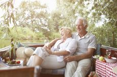 Older couple sitting on their deck