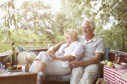 Older couple sitting on their deck