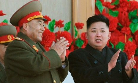 North Korean leader Kim Jong Un (right) with the Korean People&amp;#039;s Army Ri Yong-ho