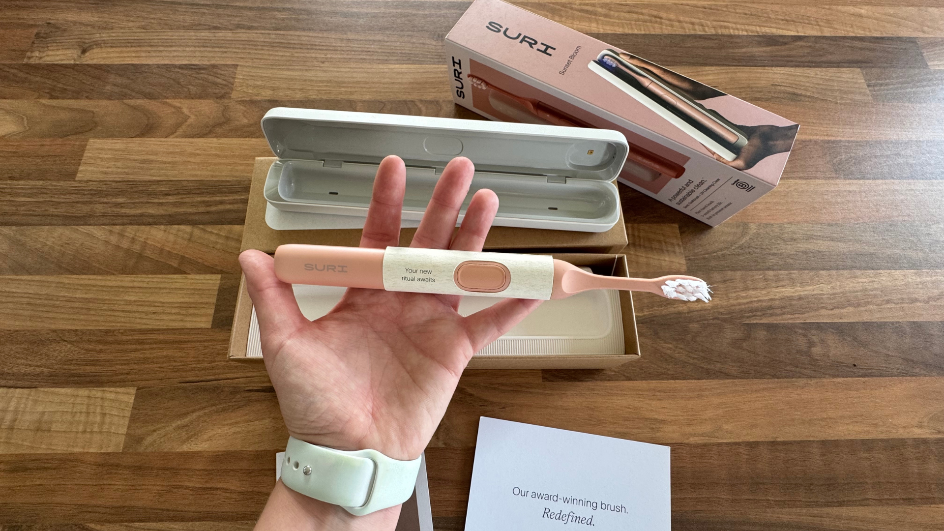 The Suri 2.0 electric toothbrush pictured during unboxing
