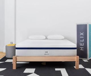 A Helix Midnight Hybrid Mattress in a bedroom.