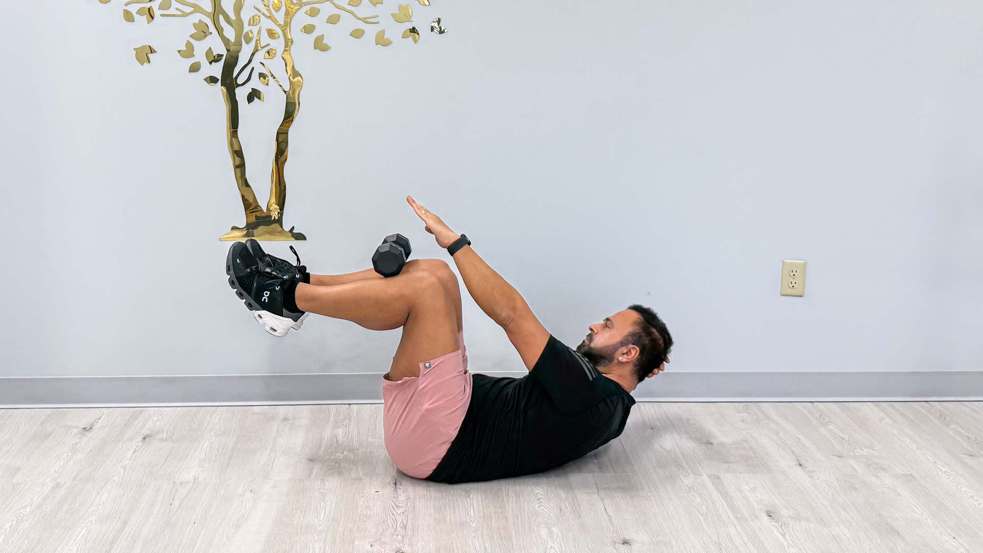 Nico Gonzalez completing the abs curl balance exercise