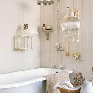 bathroom with bathmat and wire rack