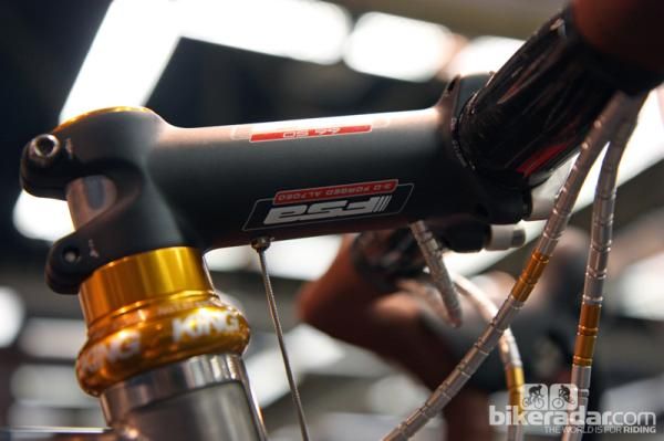 A couple of additional holes and some extra-flexible Nokon housing makes for neat cable routing on this Naked all-road bike.