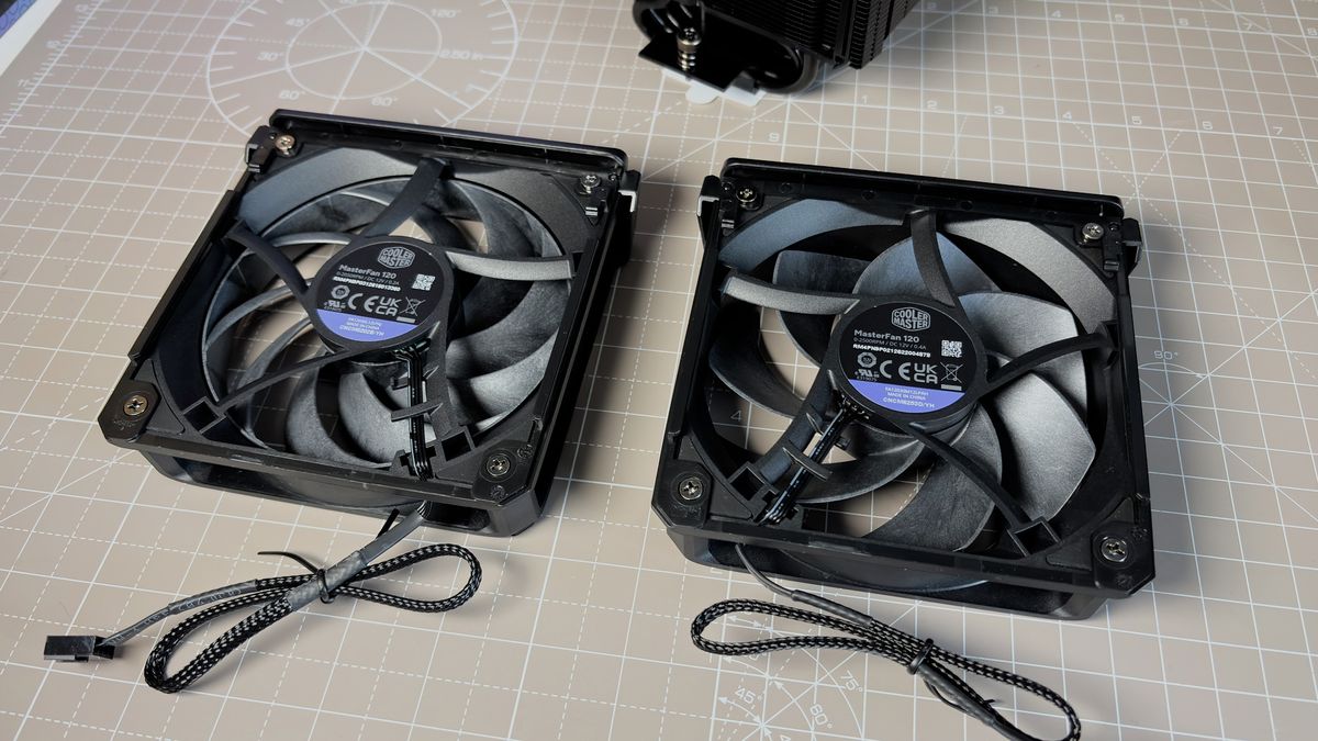 The Cooler Master V8 Ace 3DHP installed on a test bench and on its box.