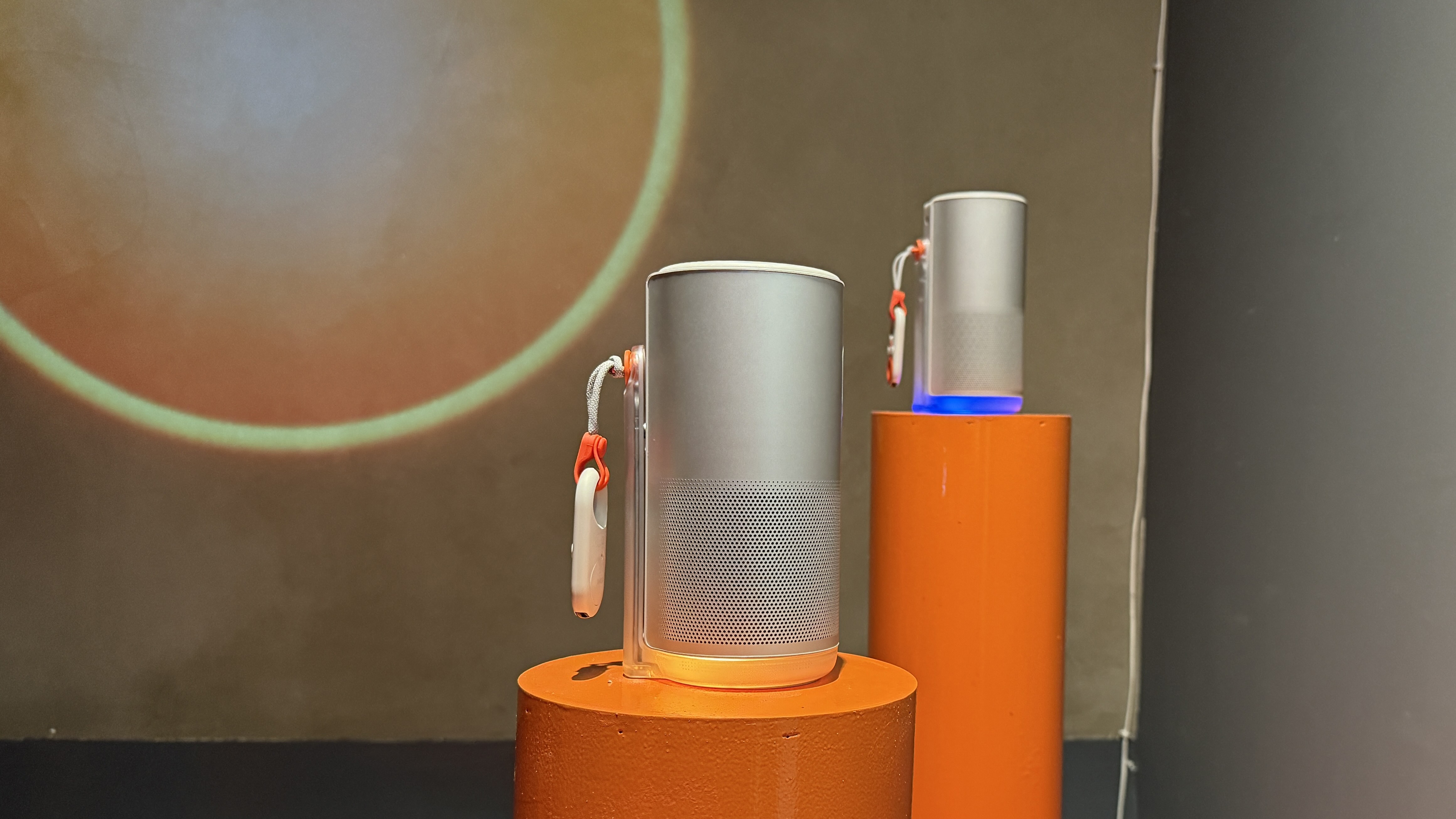 The XGIMI MoGo 4 portable projector on a stand in a display room