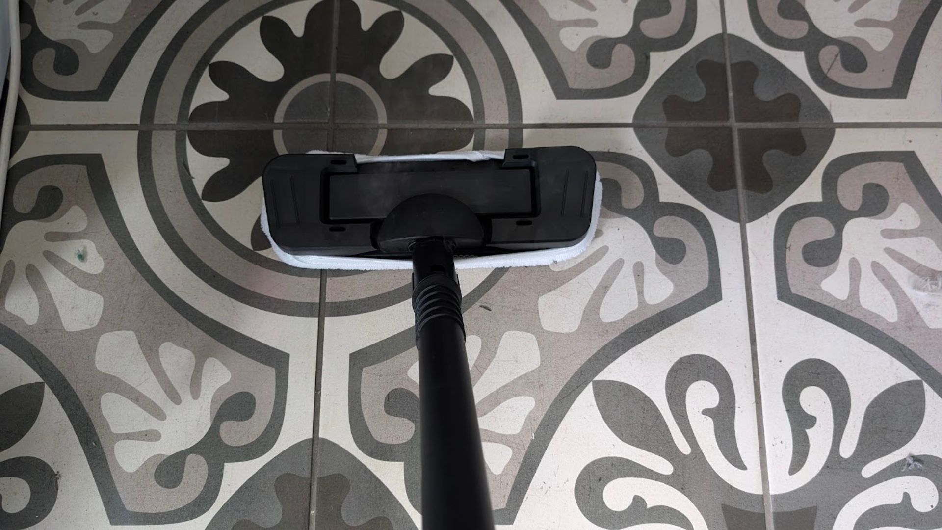 Testing the Beldray 15-in-1 Steam Cleaner cleaning mosaic floor