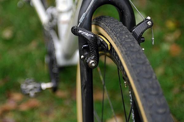 Carbon fiber TRP CR950 cantilevers clamp down on Mavic rims with SwissStop pads.