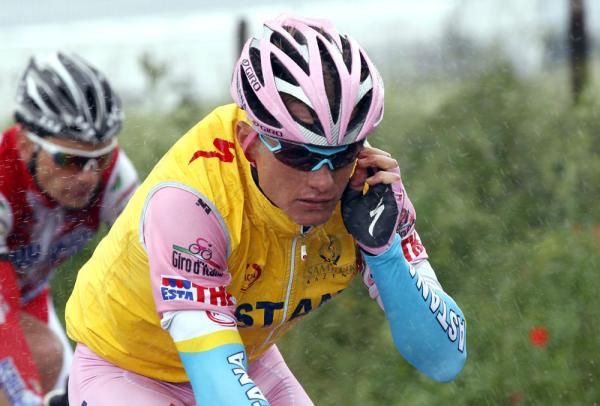 At least it's not muddy: Alexandre Vinokourov (Astana) was well wrapped up against the elements today