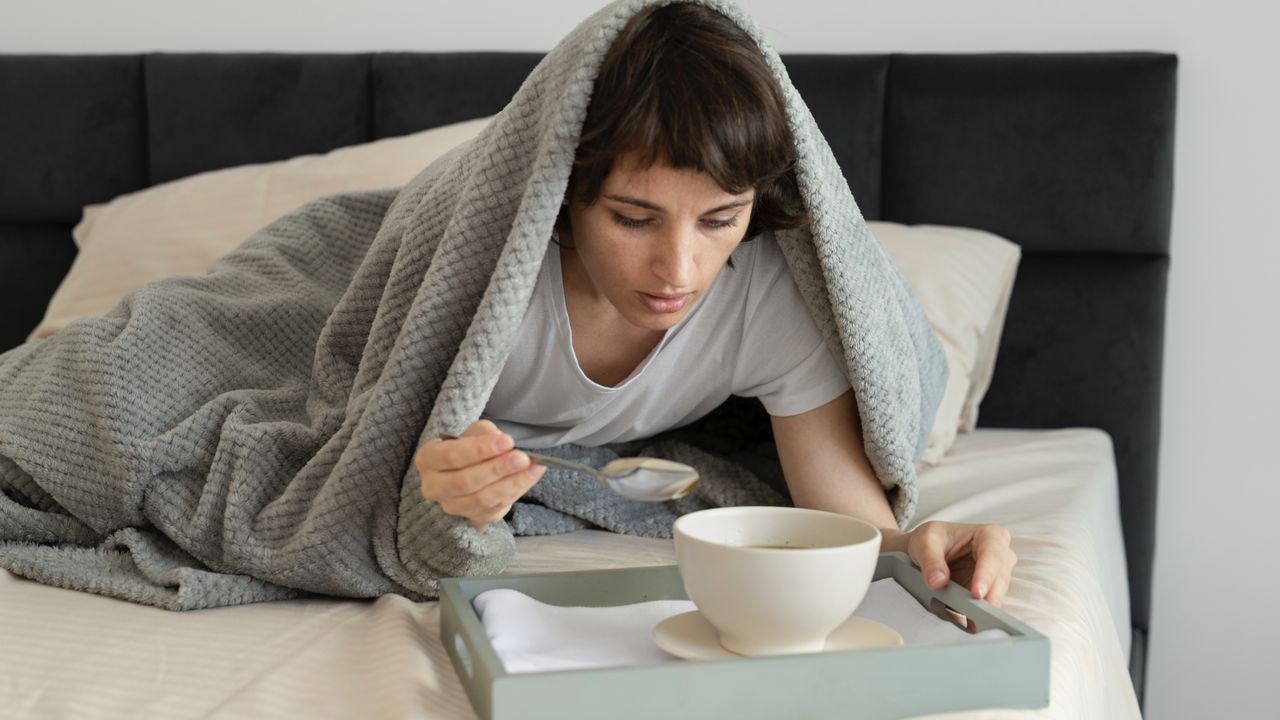 woman cold in bed