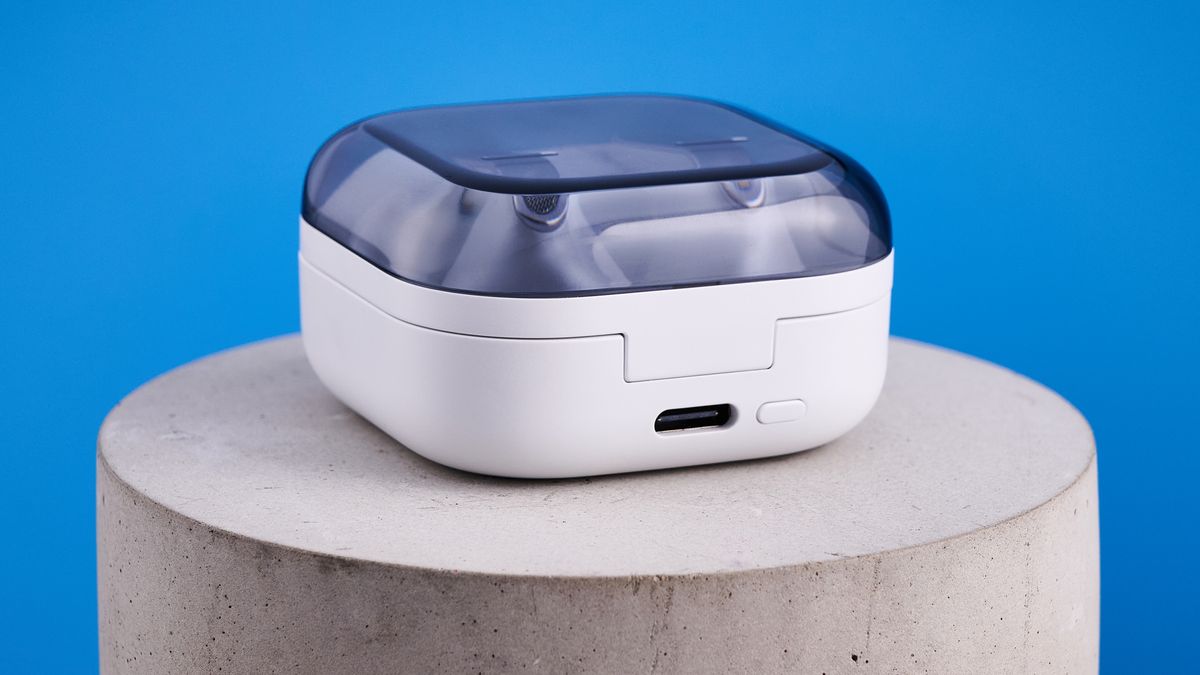 the samsung galaxy buds 4 pro in white photographed against the blue tom's guide background