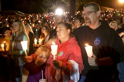 Candlelight vigil for victims of the October 1 shooting