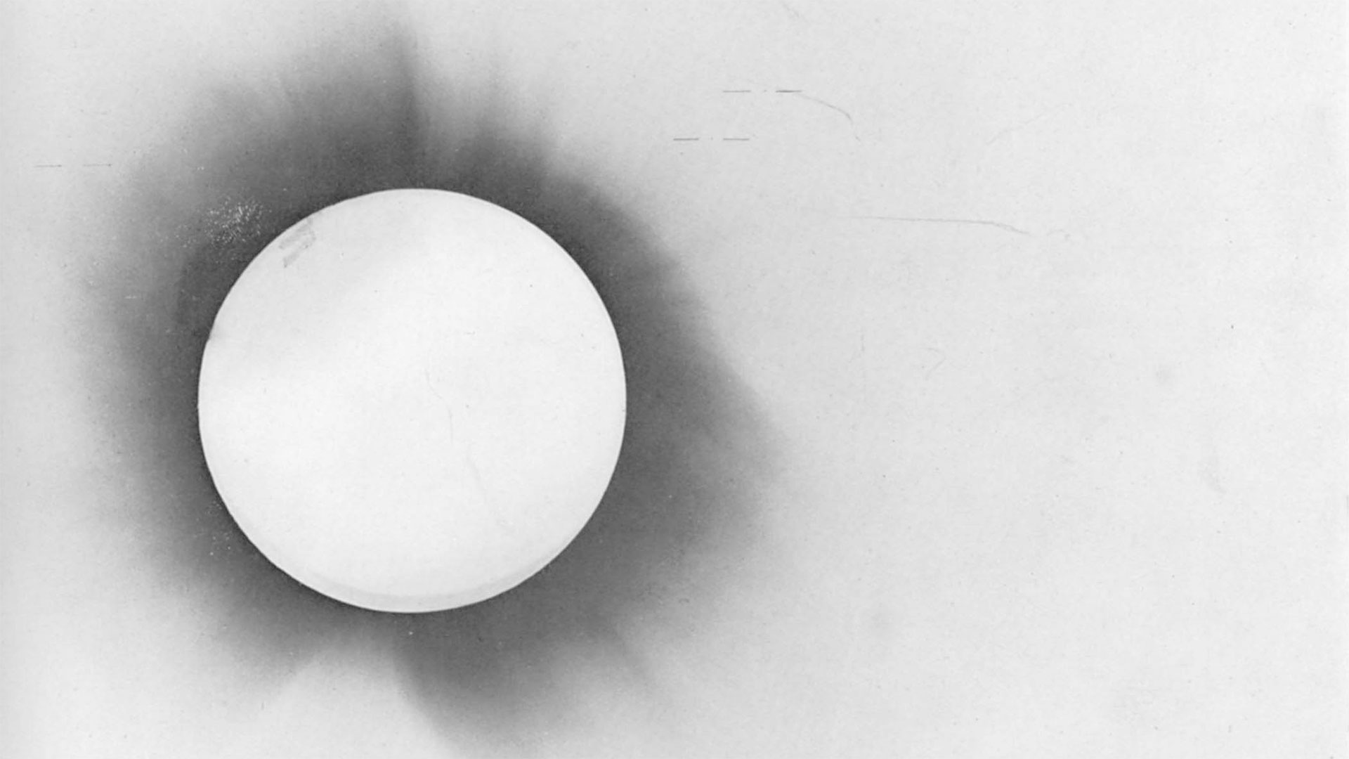 negative photo of a solar eclipse